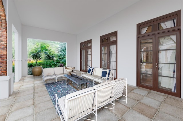 exterior space featuring light tile floors and french doors