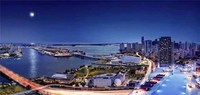 aerial view at twilight with a water view