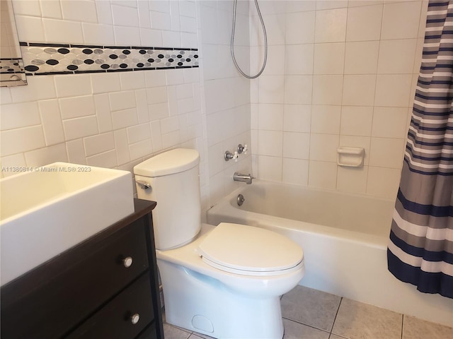 full bathroom featuring tile walls, toilet, shower / tub combo with curtain, tile flooring, and vanity