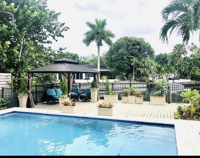 view of swimming pool featuring a gazebo