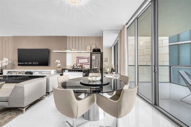 dining room featuring light tile floors