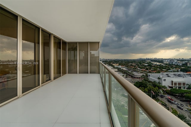 view of balcony at dusk