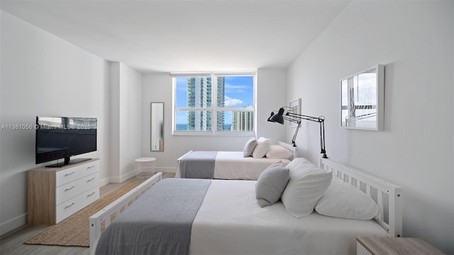 bedroom featuring light wood-type flooring