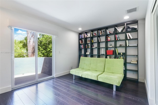 unfurnished room with dark hardwood / wood-style flooring