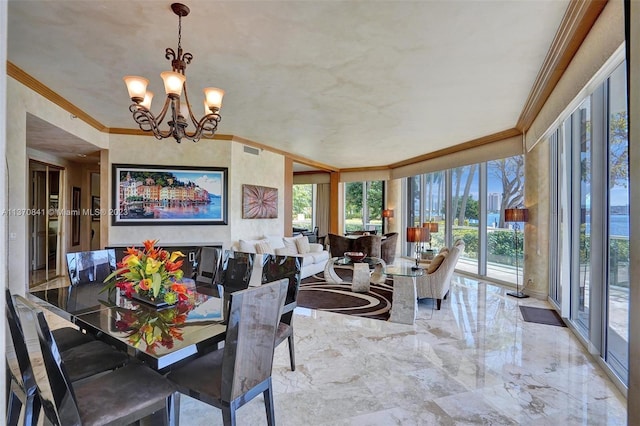 dining space featuring an inviting chandelier, a water view, light tile floors, and ornamental molding