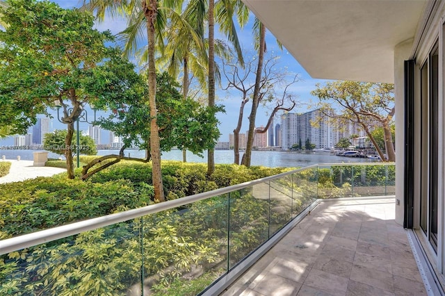 balcony featuring a water view