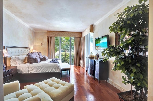 bedroom with ornamental molding and dark hardwood / wood-style flooring