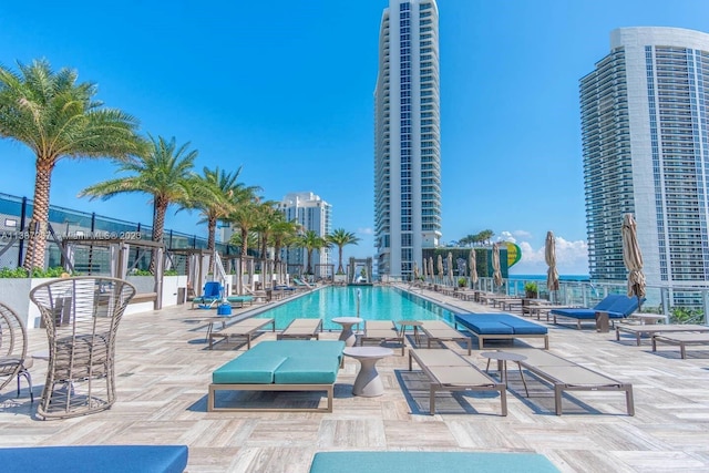 view of swimming pool featuring a patio area