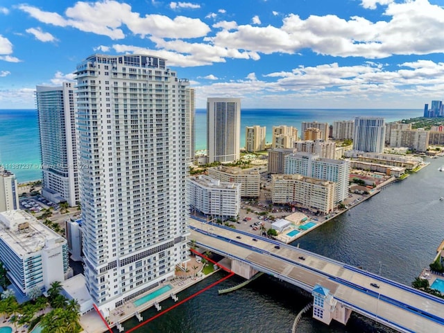 birds eye view of property featuring a water view