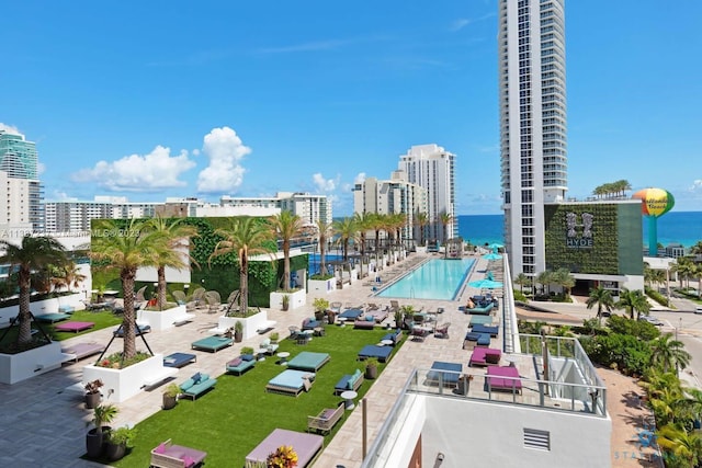 birds eye view of property featuring a water view