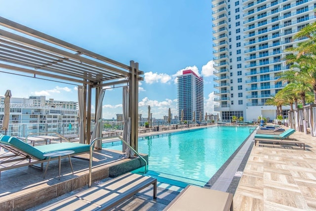 view of pool with a pergola