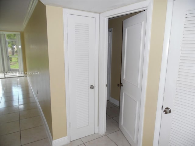 hallway with light tile floors