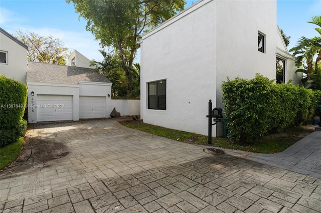 view of home's exterior featuring a garage