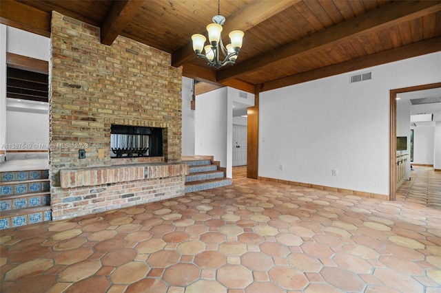 unfurnished living room with a brick fireplace, light tile floors, wood ceiling, an inviting chandelier, and beam ceiling