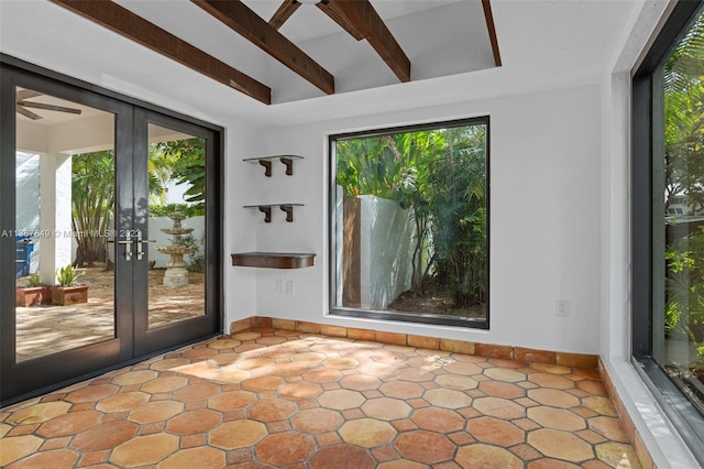 interior space with french doors, beam ceiling, and ceiling fan