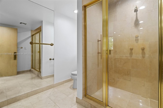 bathroom featuring walk in shower, toilet, and tile flooring