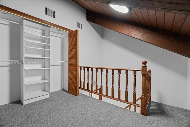 bonus room with carpet and wooden ceiling