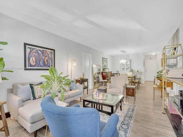 living room with light hardwood / wood-style flooring