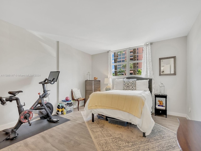 bedroom featuring light wood-type flooring