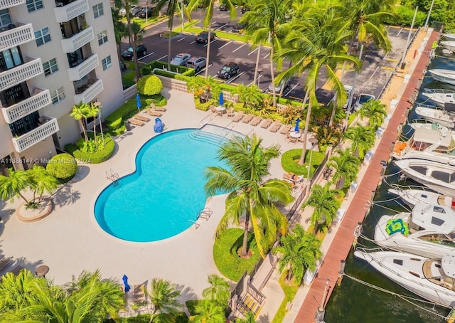 view of swimming pool with a patio