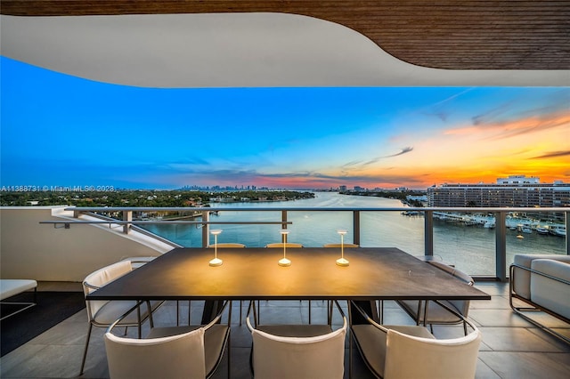 balcony at dusk with a water view