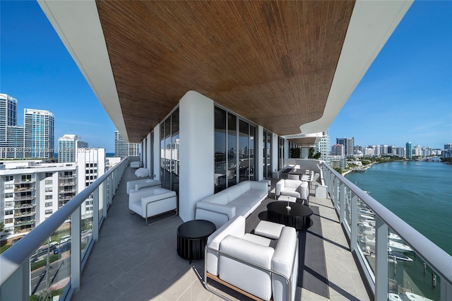 balcony featuring a water view