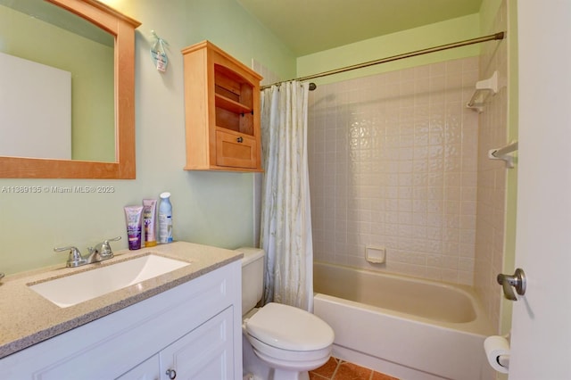 full bathroom with toilet, shower / tub combo, large vanity, and tile flooring