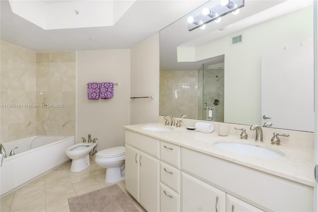 full bathroom with toilet, a bidet, independent shower and bath, tile patterned floors, and vanity