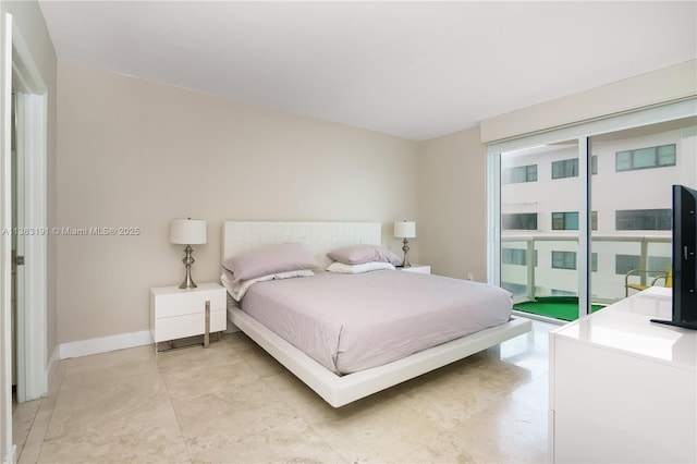 6365 Collins Ave Unit 907, Miami Beach, FL 33141 - bedroom featuring baseboards and access to outside