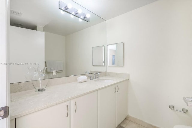 bathroom featuring vanity and tile patterned floors