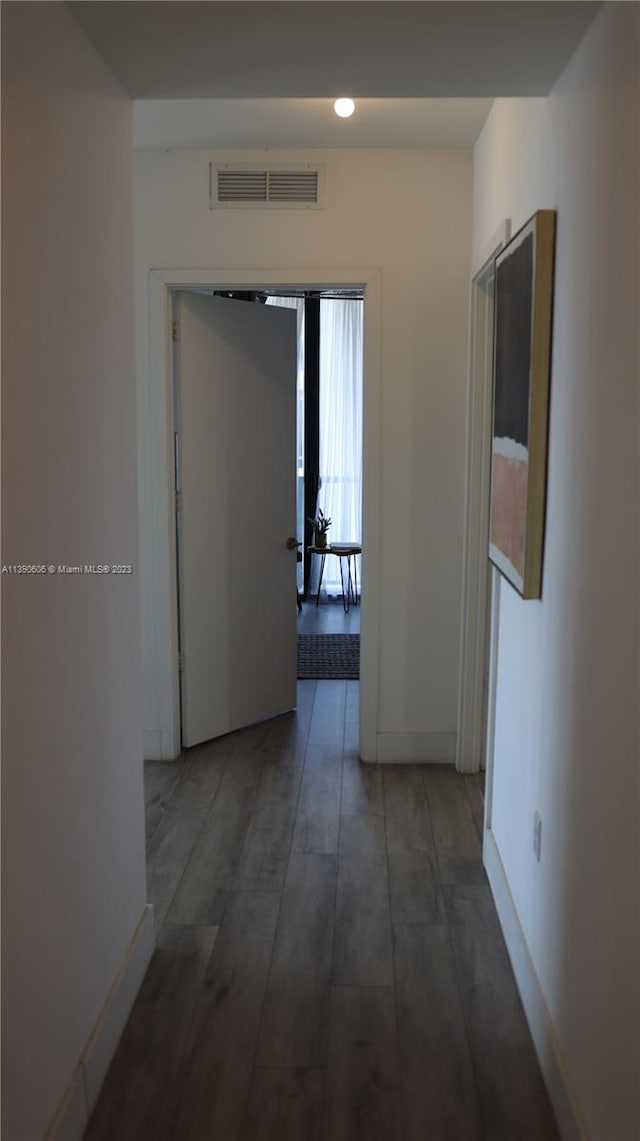 hallway featuring light wood-type flooring