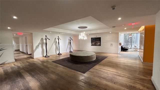 interior space featuring a chandelier and light wood-type flooring