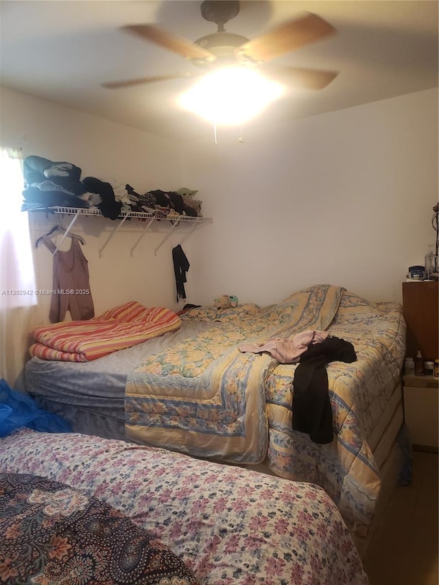 bedroom featuring ceiling fan