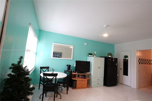 office area featuring plenty of natural light and light tile flooring