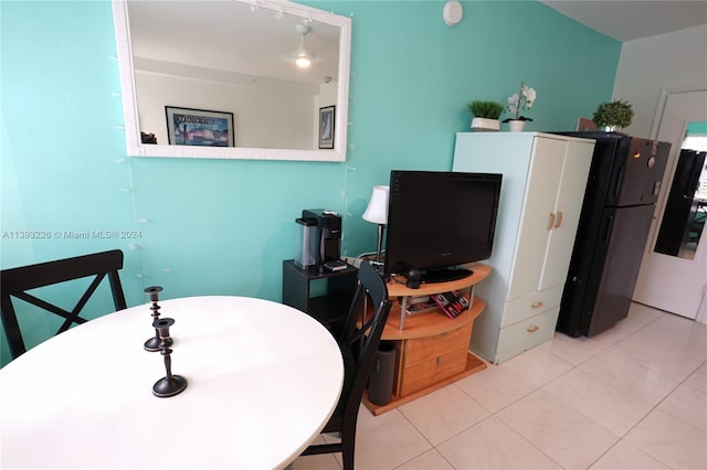 dining room with light tile floors