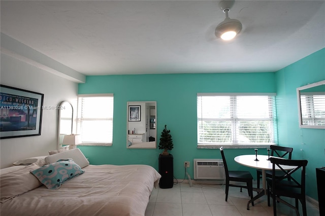 tiled bedroom with a wall mounted AC