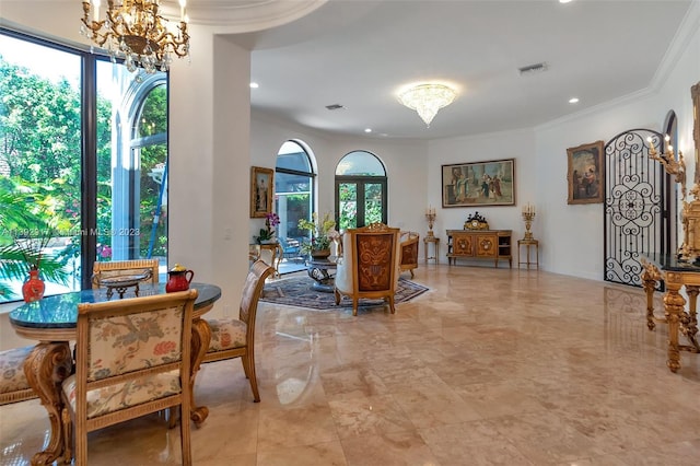 interior space featuring crown molding, a notable chandelier, a healthy amount of sunlight, and light tile floors