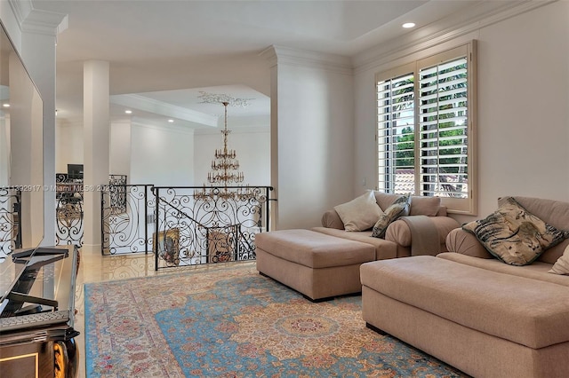 living room with ornamental molding and light hardwood / wood-style flooring