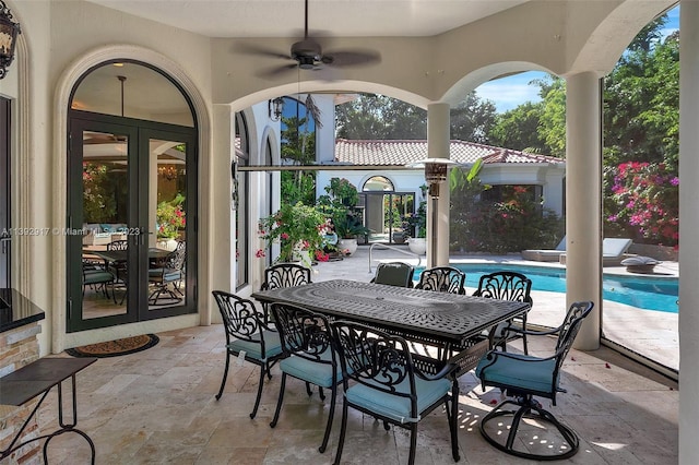 view of patio / terrace featuring french doors and ceiling fan