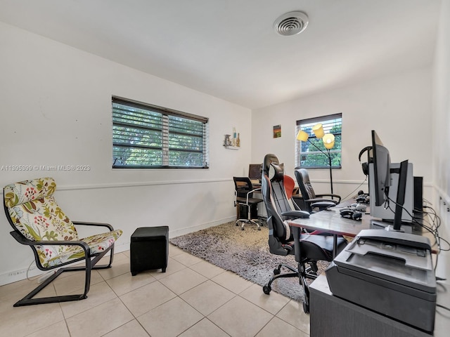 tiled home office with plenty of natural light