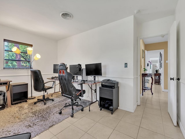 office area featuring light tile flooring