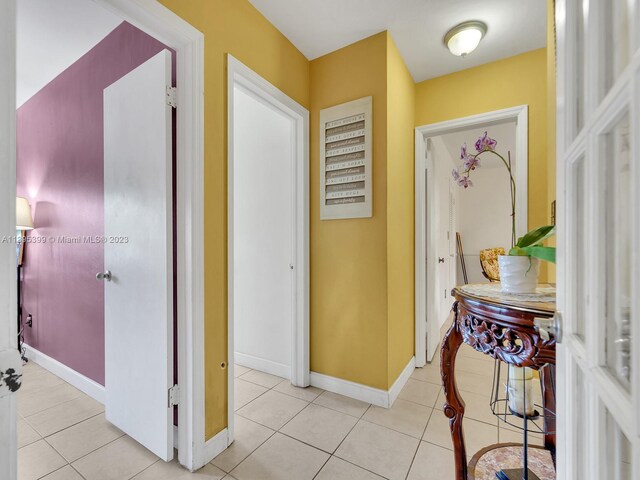 hallway with light tile floors