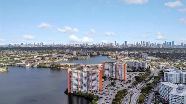 aerial view with a water view and a city view