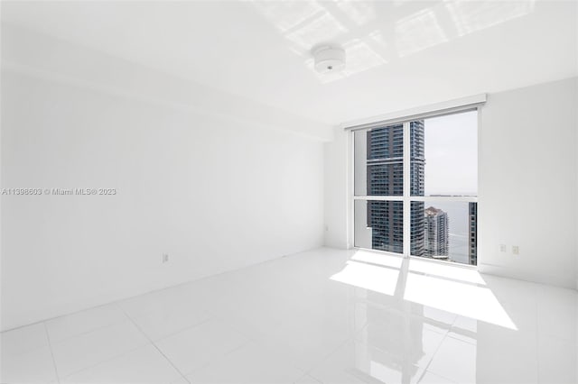 empty room with light tile flooring