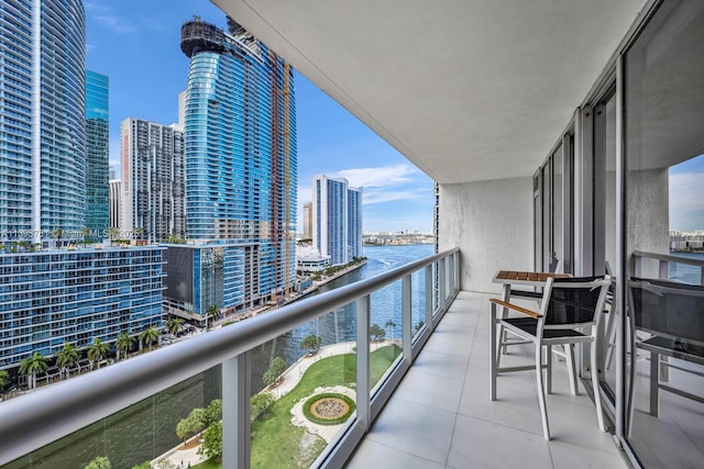 balcony featuring a water view