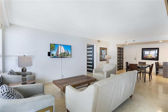 living room with light tile patterned floors