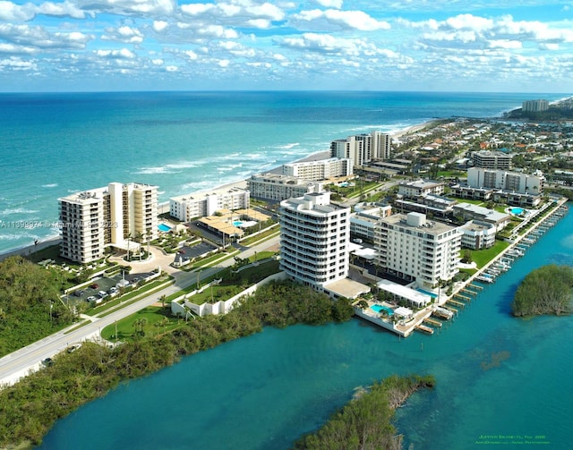 birds eye view of property featuring a water view