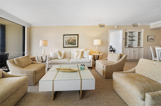 carpeted living room with crown molding