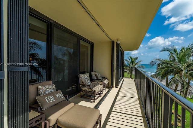 balcony featuring a water view