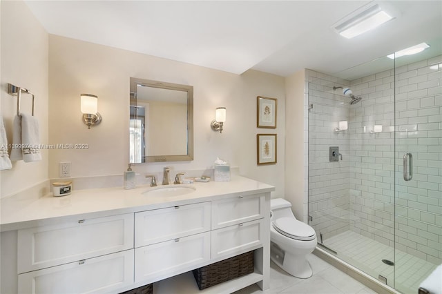 bathroom featuring walk in shower, tile floors, toilet, and vanity